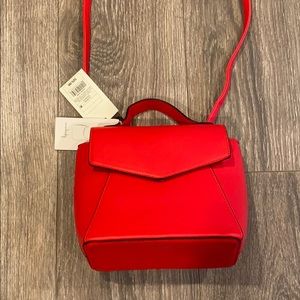 Brand new mini backpack/crossbody bag